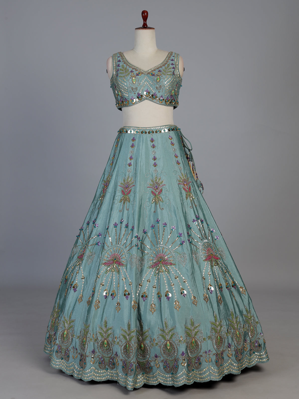 Light blue silk lehenga choli with pearls mirrors and zardosi work