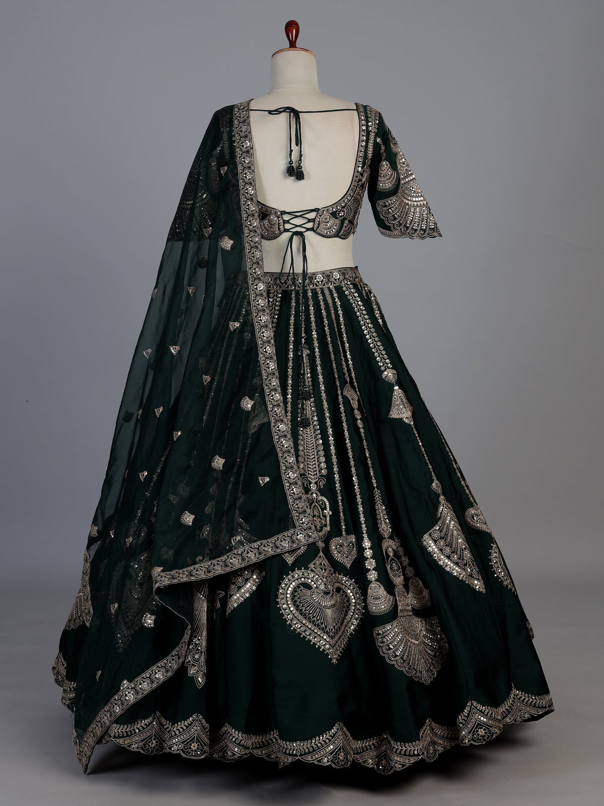 Bottle green silk lehenga choli with embroidered work and dupatta
