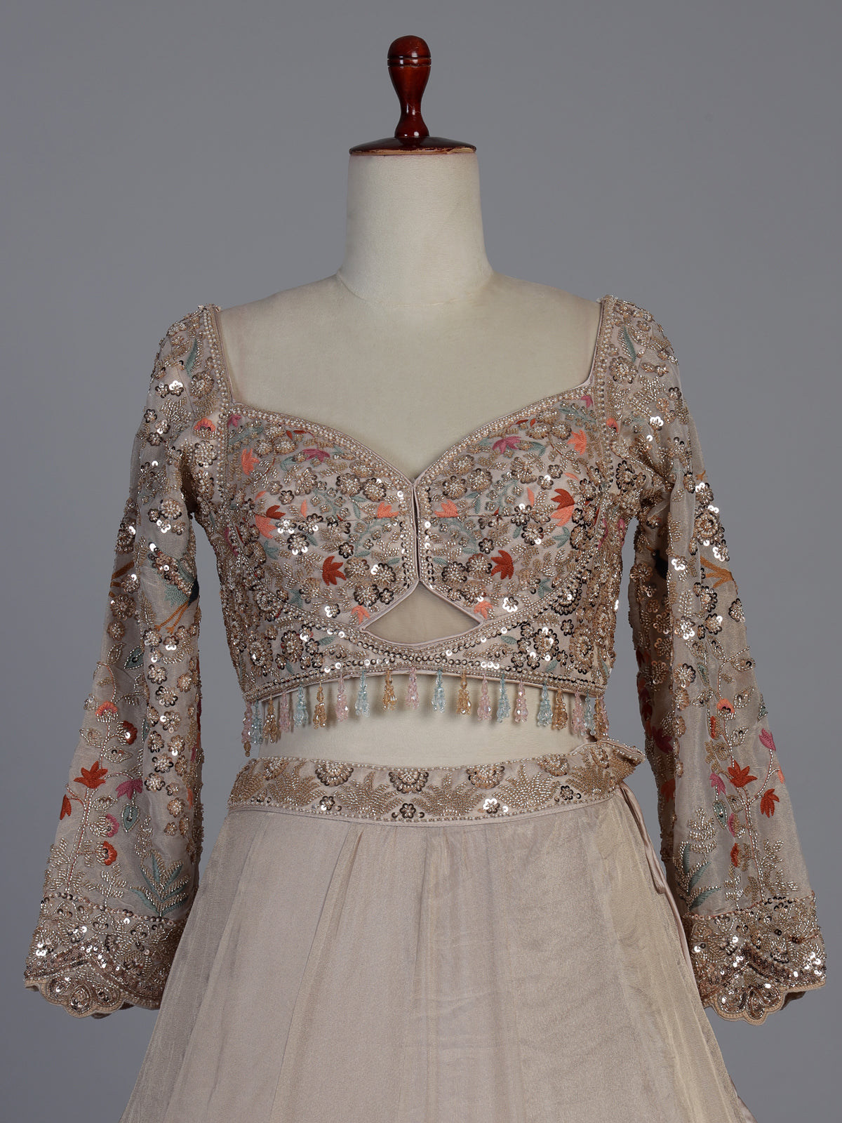 Beige silk designer lehenga choli with bird motif