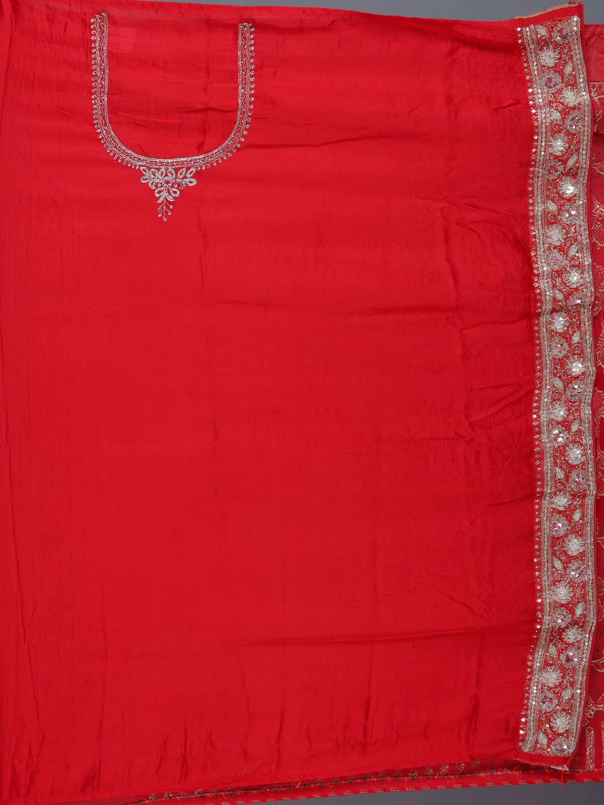 Red dola silk saree with floral zardosi and pearl zari work