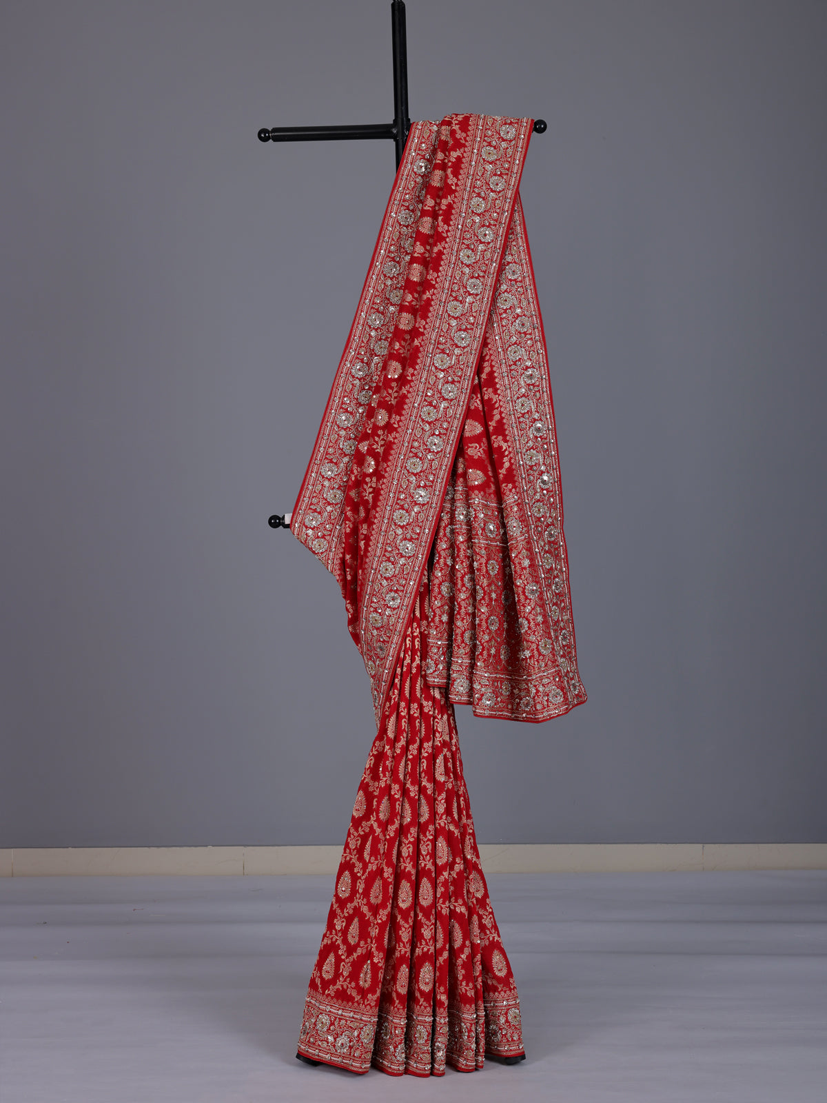 Red dola silk saree with floral diamond zardosi embellishments