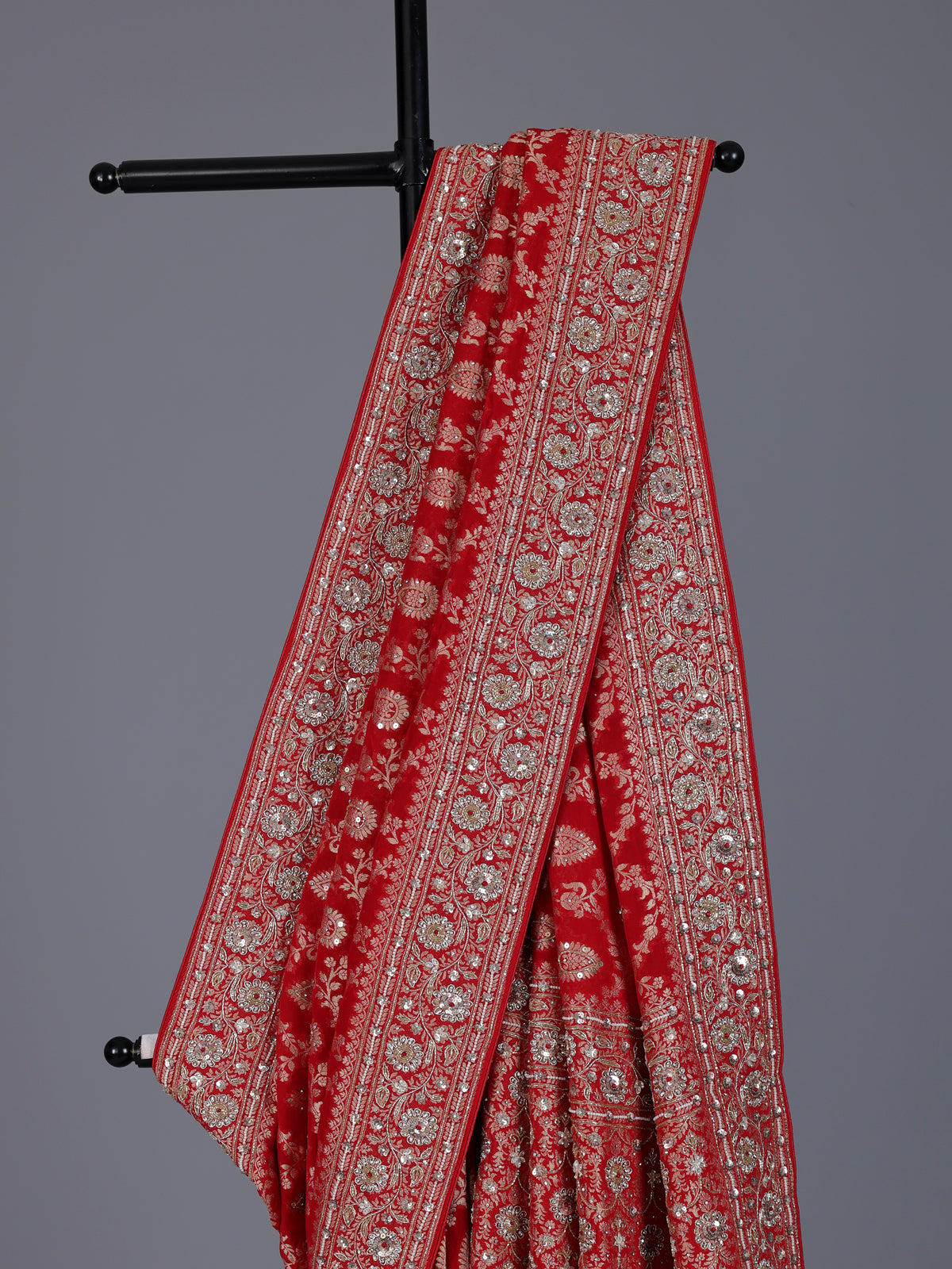 Red dola silk saree with floral diamond zardosi embellishments