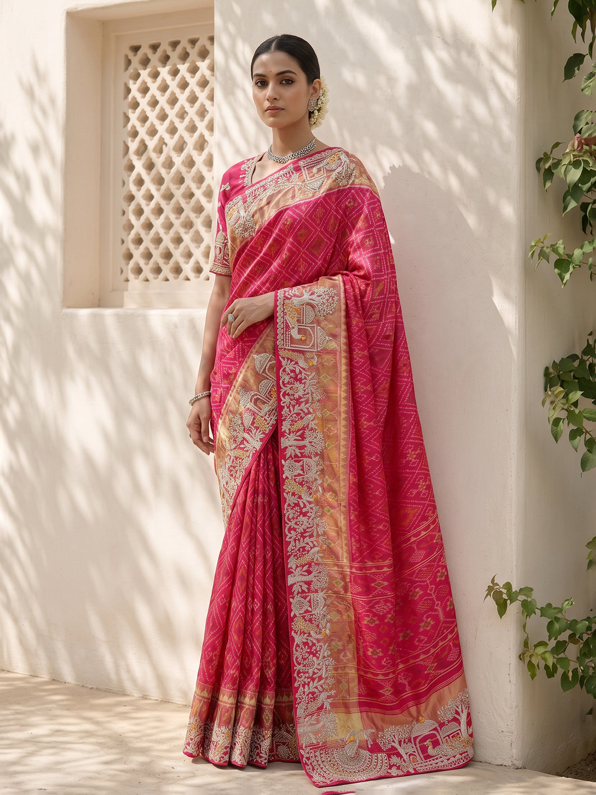 Rani pink patola silk saree with bird motif and zari detailing
