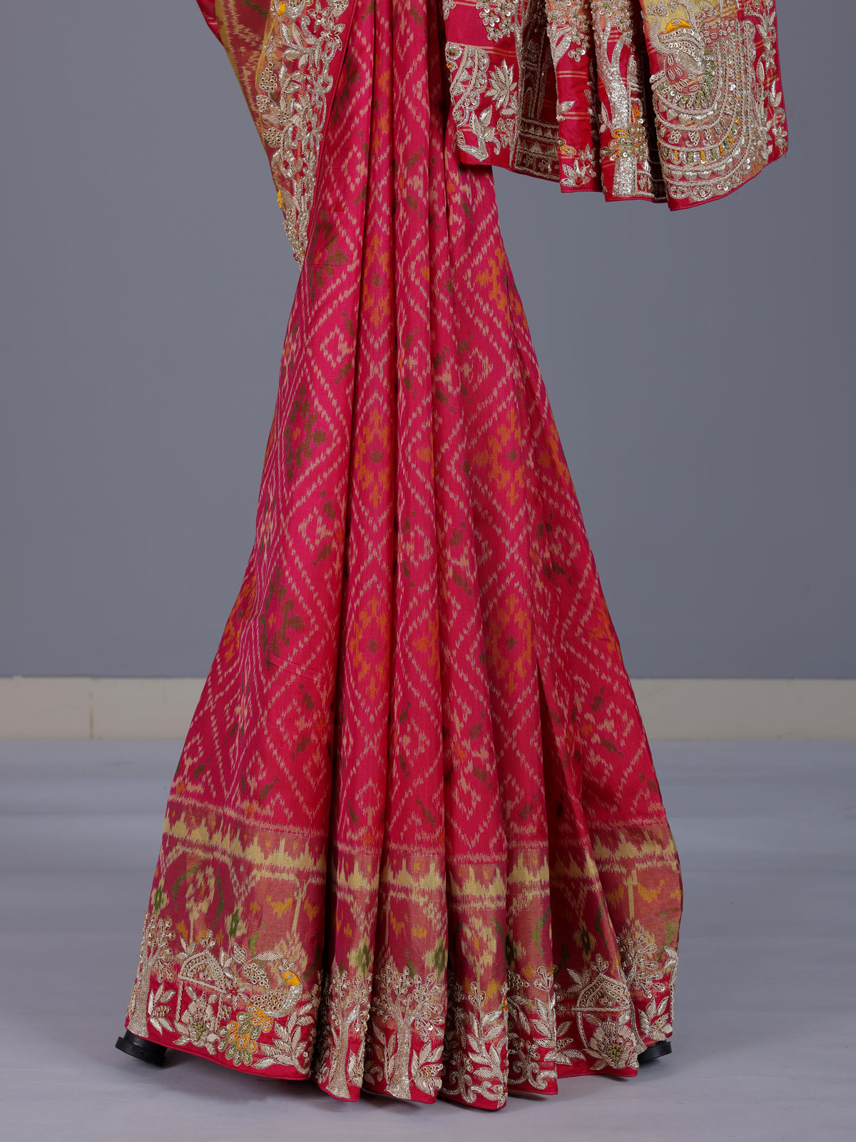 Rani pink patola silk saree with bird motif and zari detailing