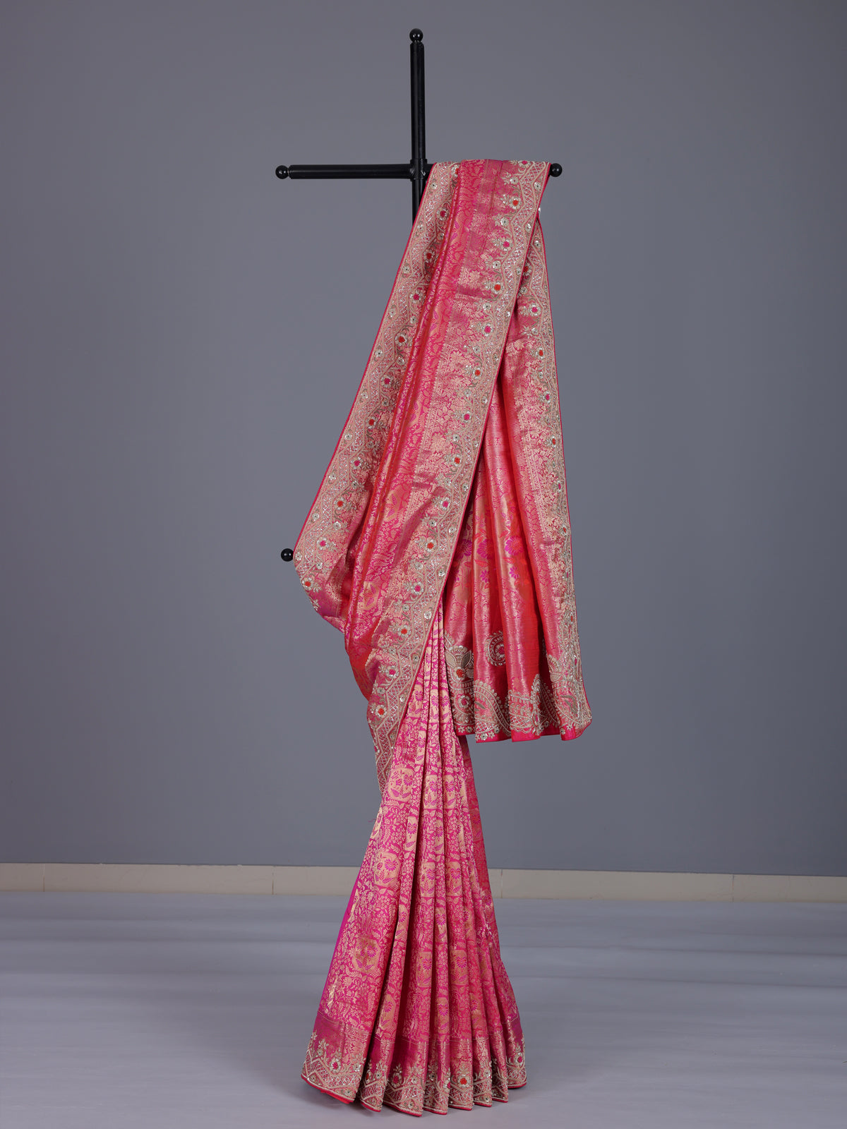 Rani pink kanjivaram silk saree with zardosi and zari work