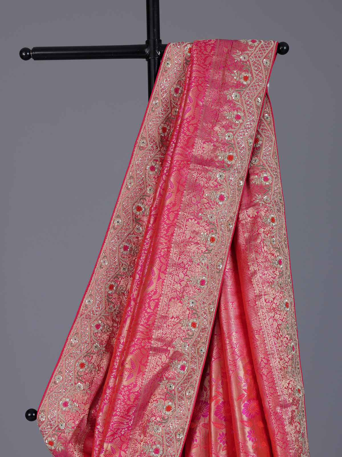 Rani pink kanjivaram silk saree with zardosi and zari work