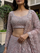 Pink net embellished designer wedding lehenga choli