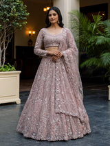 Pink net embellished designer wedding lehenga choli