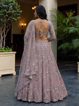 Pink net embellished designer wedding lehenga choli