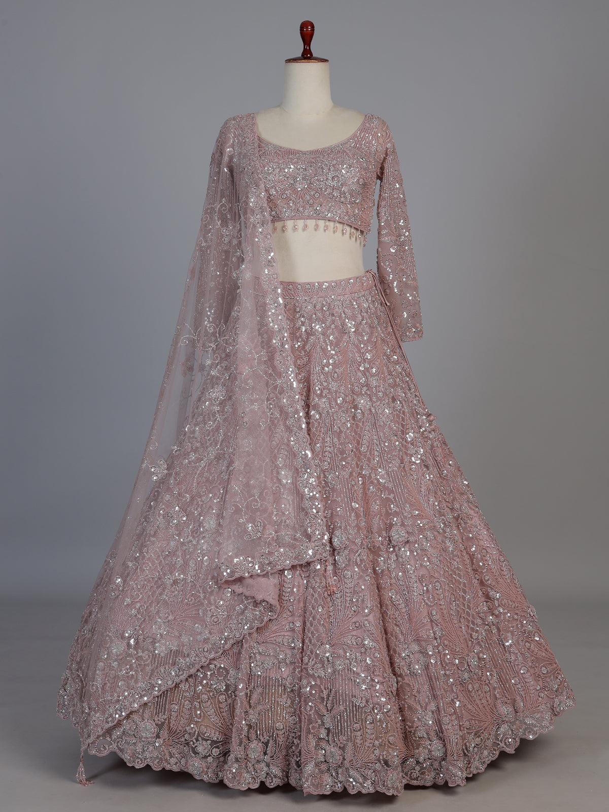 Pink net embellished designer wedding lehenga choli