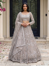 Beige net sequins embellished party lehenga choli