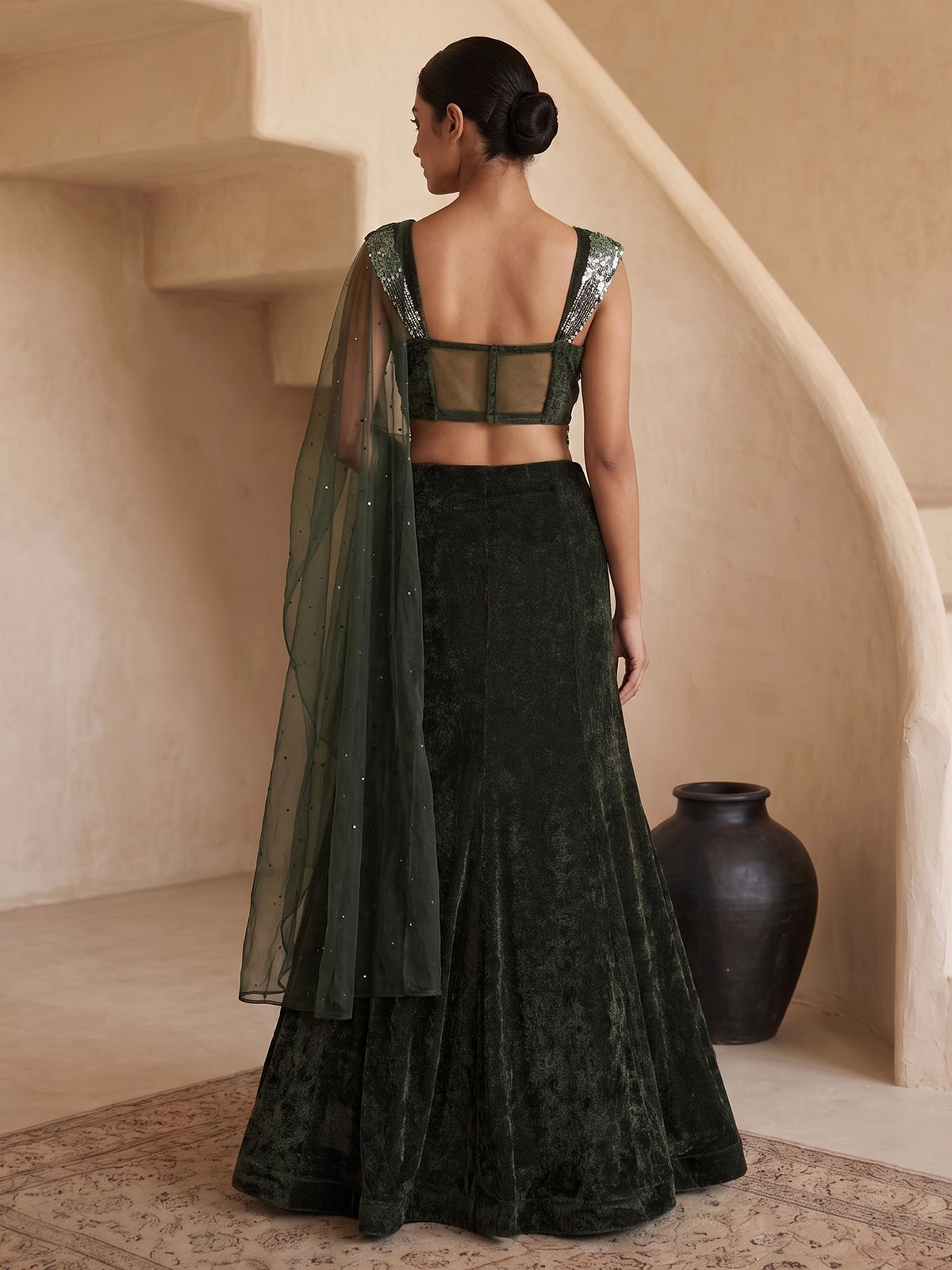Dark green velvet embellished wedding lehenga choli