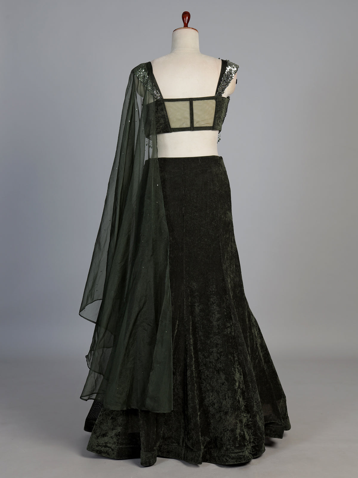 Dark green velvet embellished wedding lehenga choli