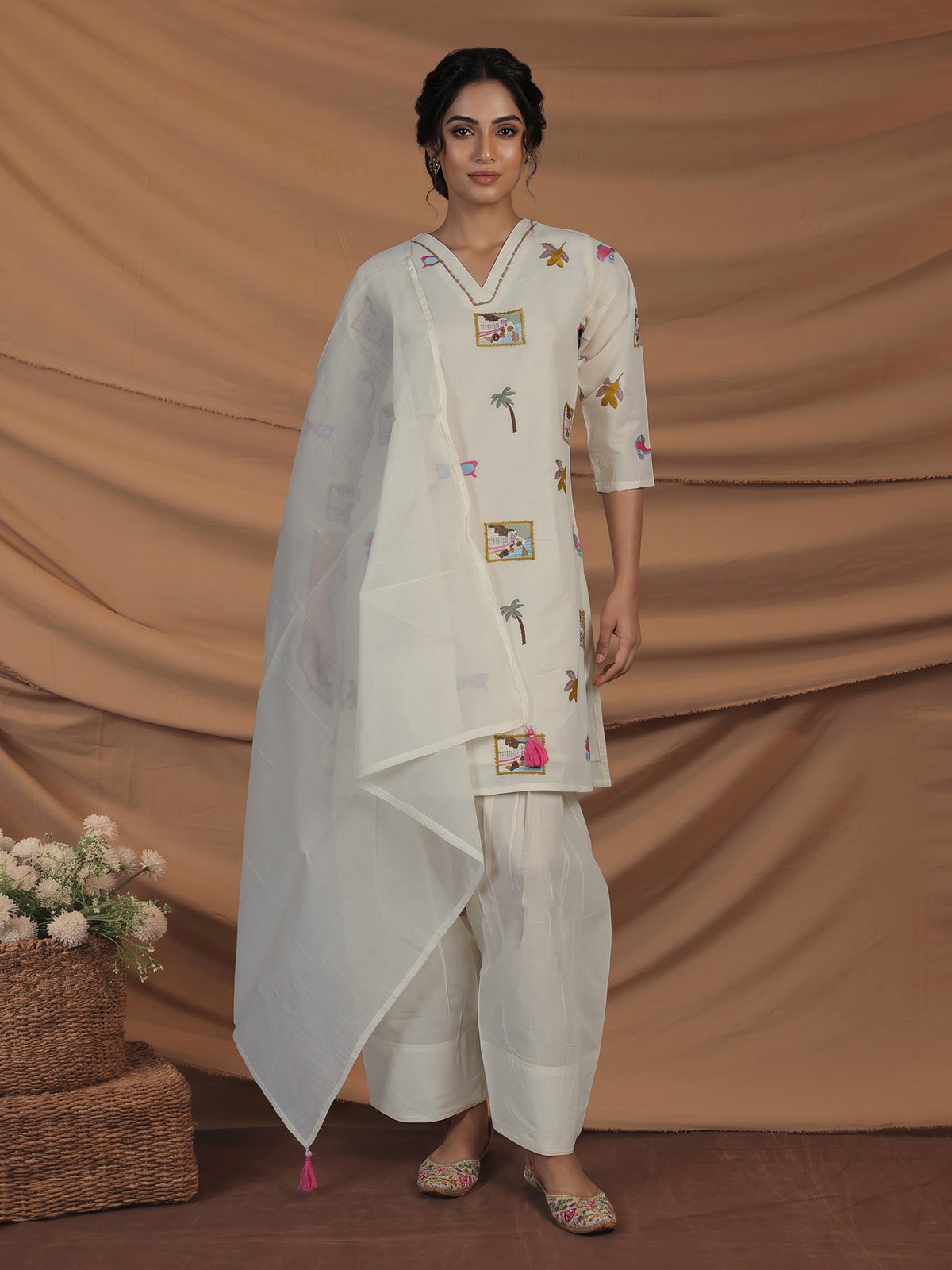 Cream cotton salwar suit with elegant V neckline