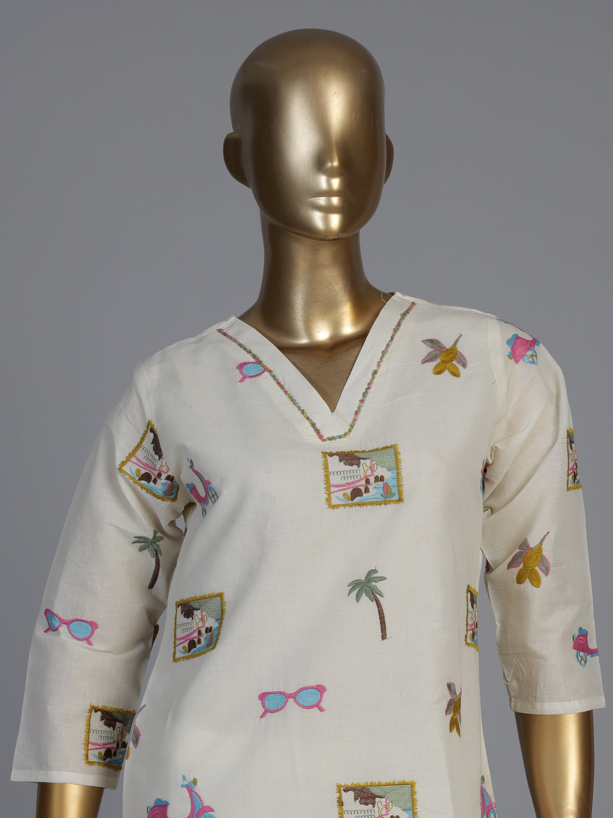 Cream cotton salwar suit with elegant V neckline