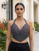 Black sequined net saree with halter blouse