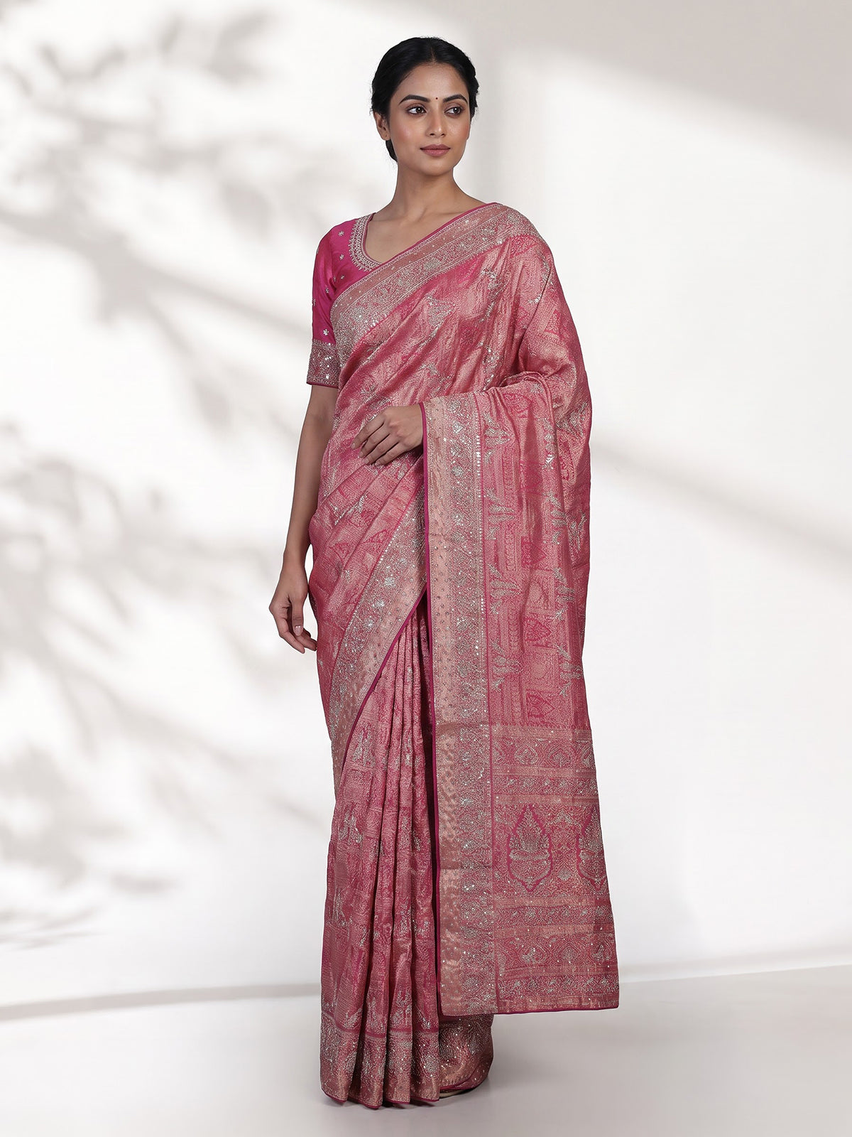 Rani pink kanjivaram silk bird motif festive designer saree