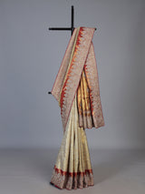 Beige tissue kanjivaram silk zardosi wedding saree with contrast pallu