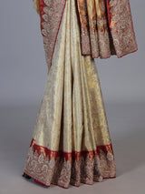 Beige tissue kanjivaram silk zardosi wedding saree with contrast pallu