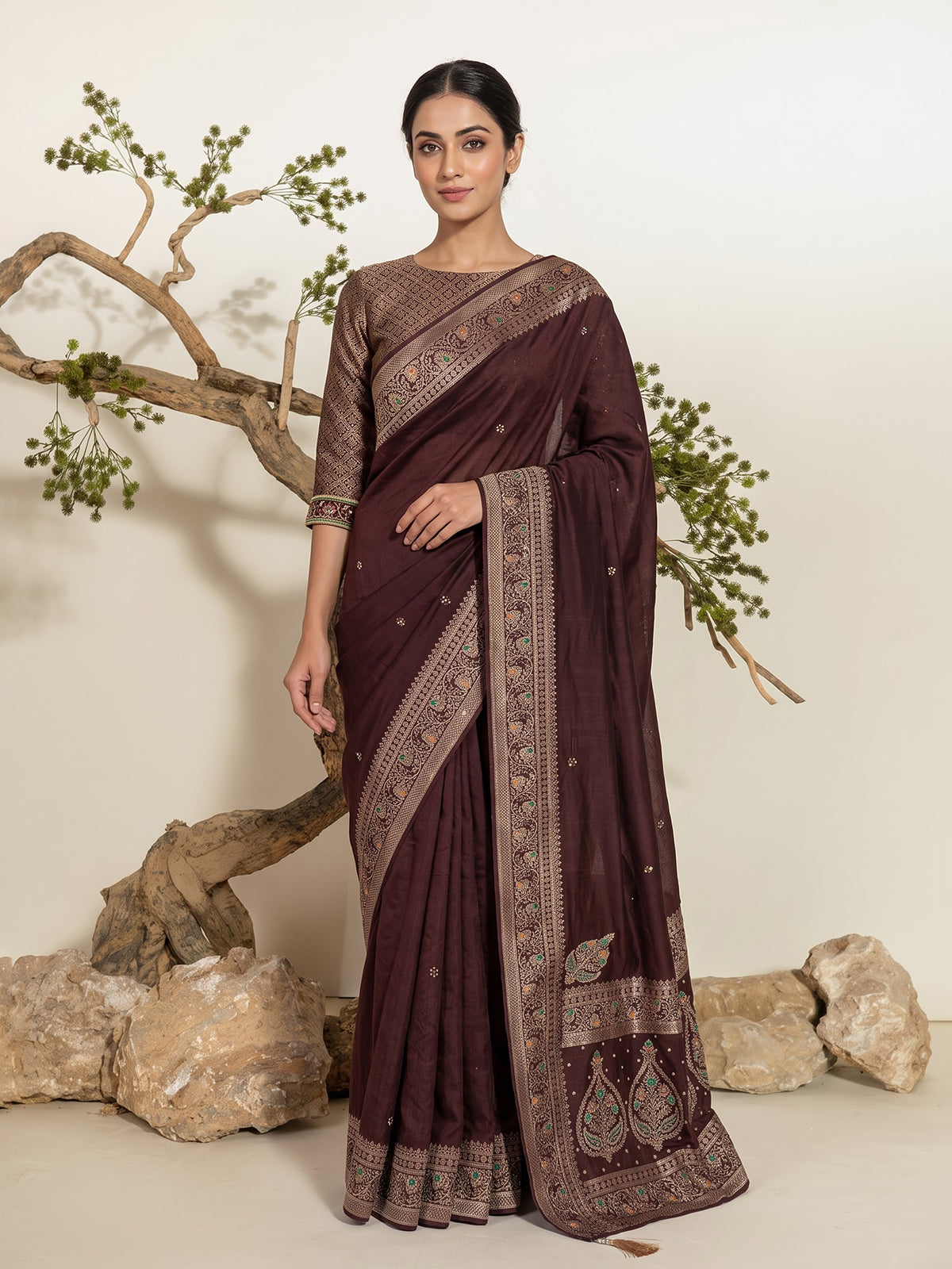 Brown dola silk saree with floral tassel embellished design
