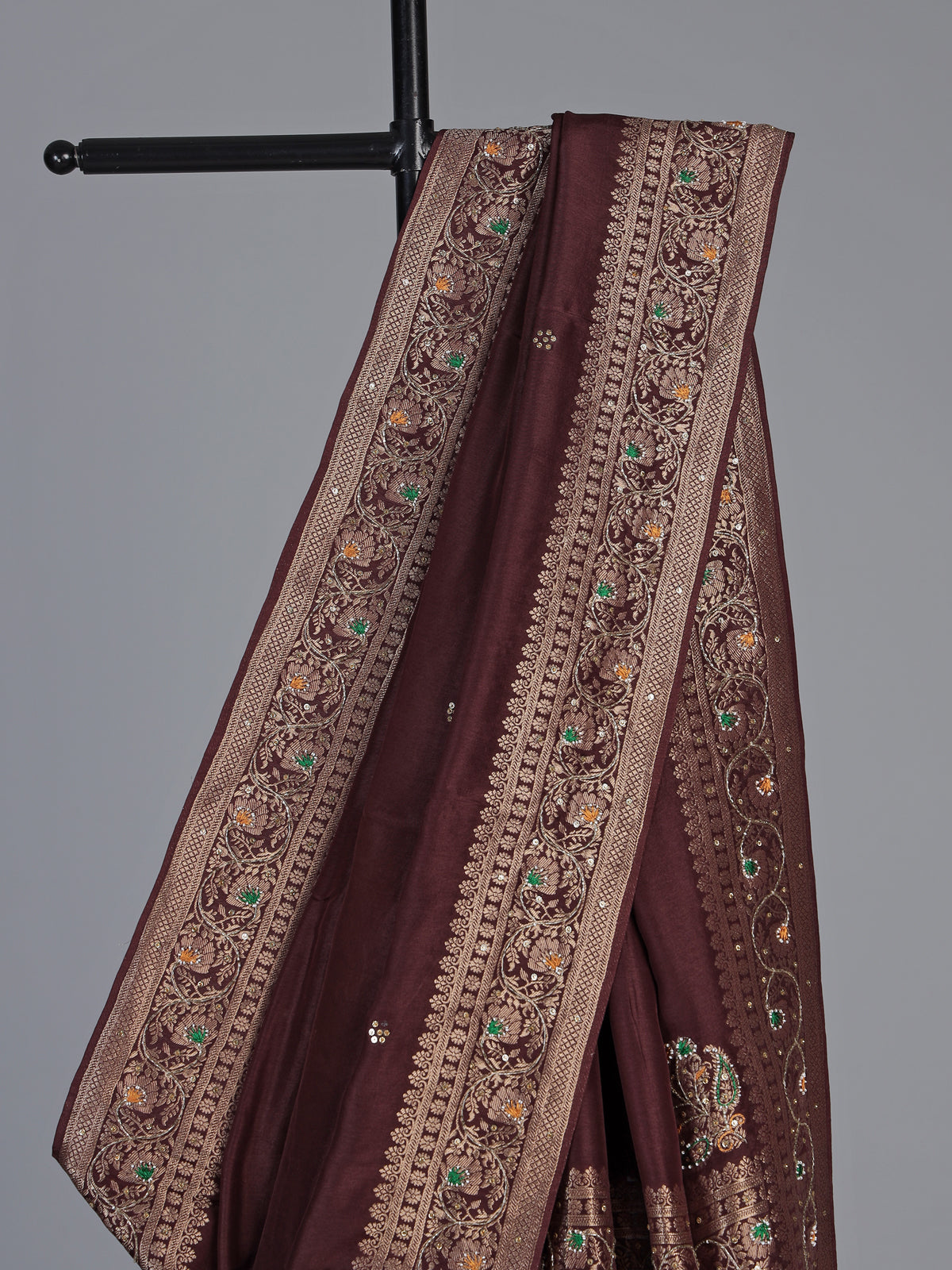 Brown dola silk saree with floral tassel embellished design