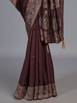 Brown dola silk saree with floral tassel embellished design