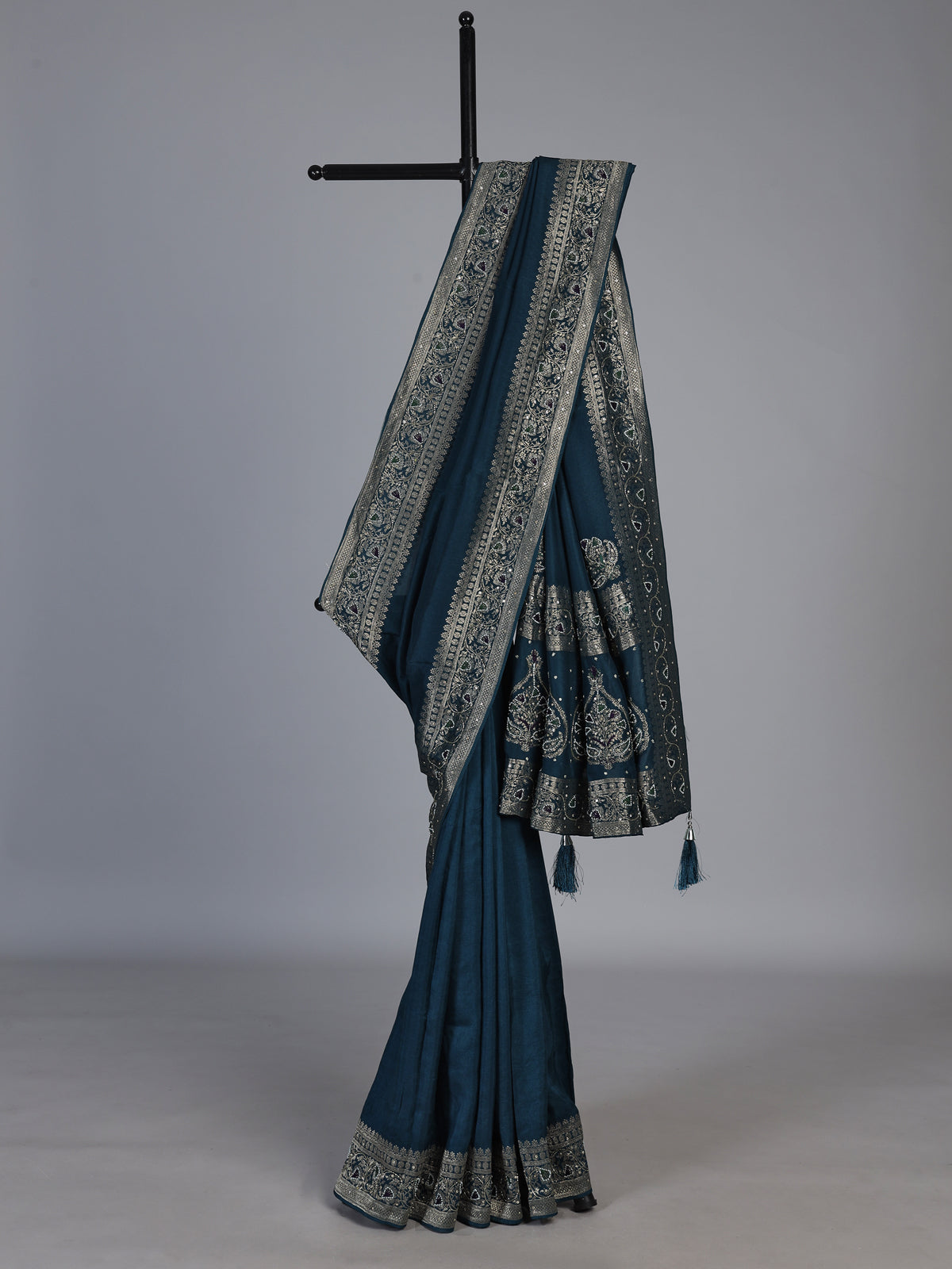 Teal blue dola silk saree with floral tassel designer work