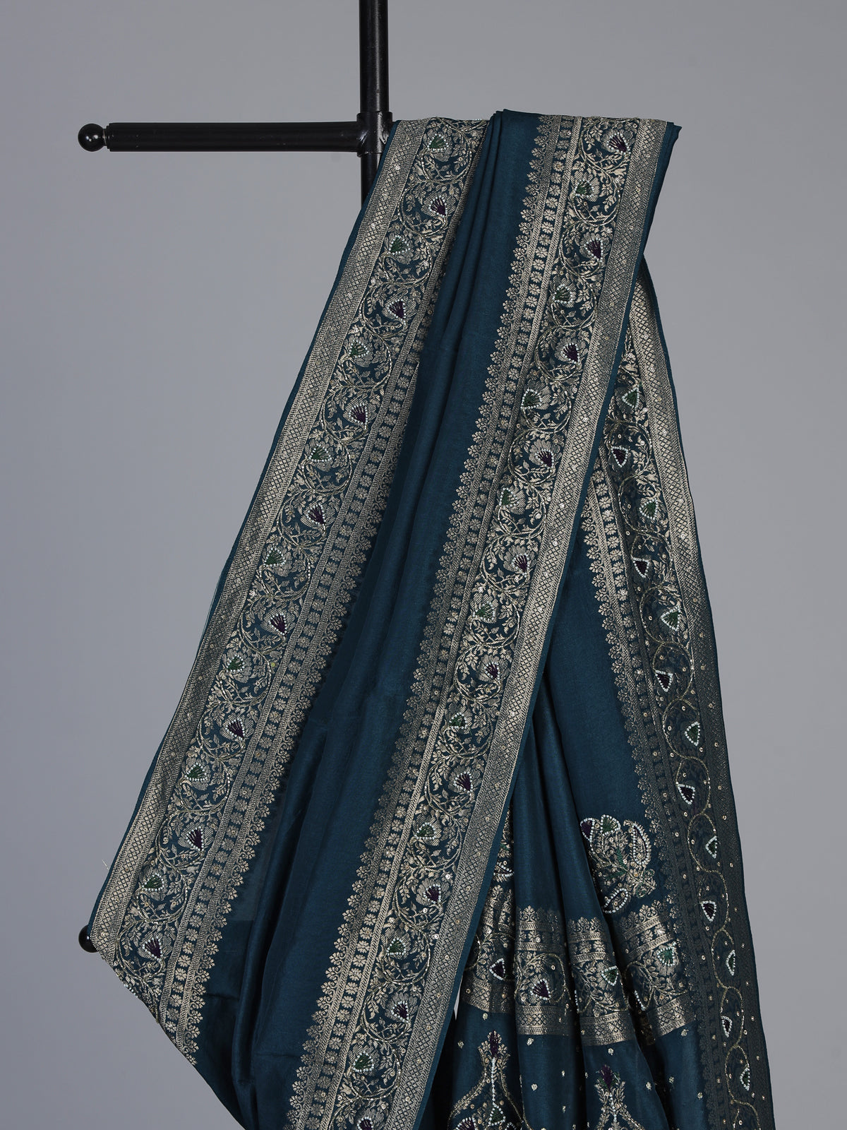 Teal blue dola silk saree with floral tassel designer work