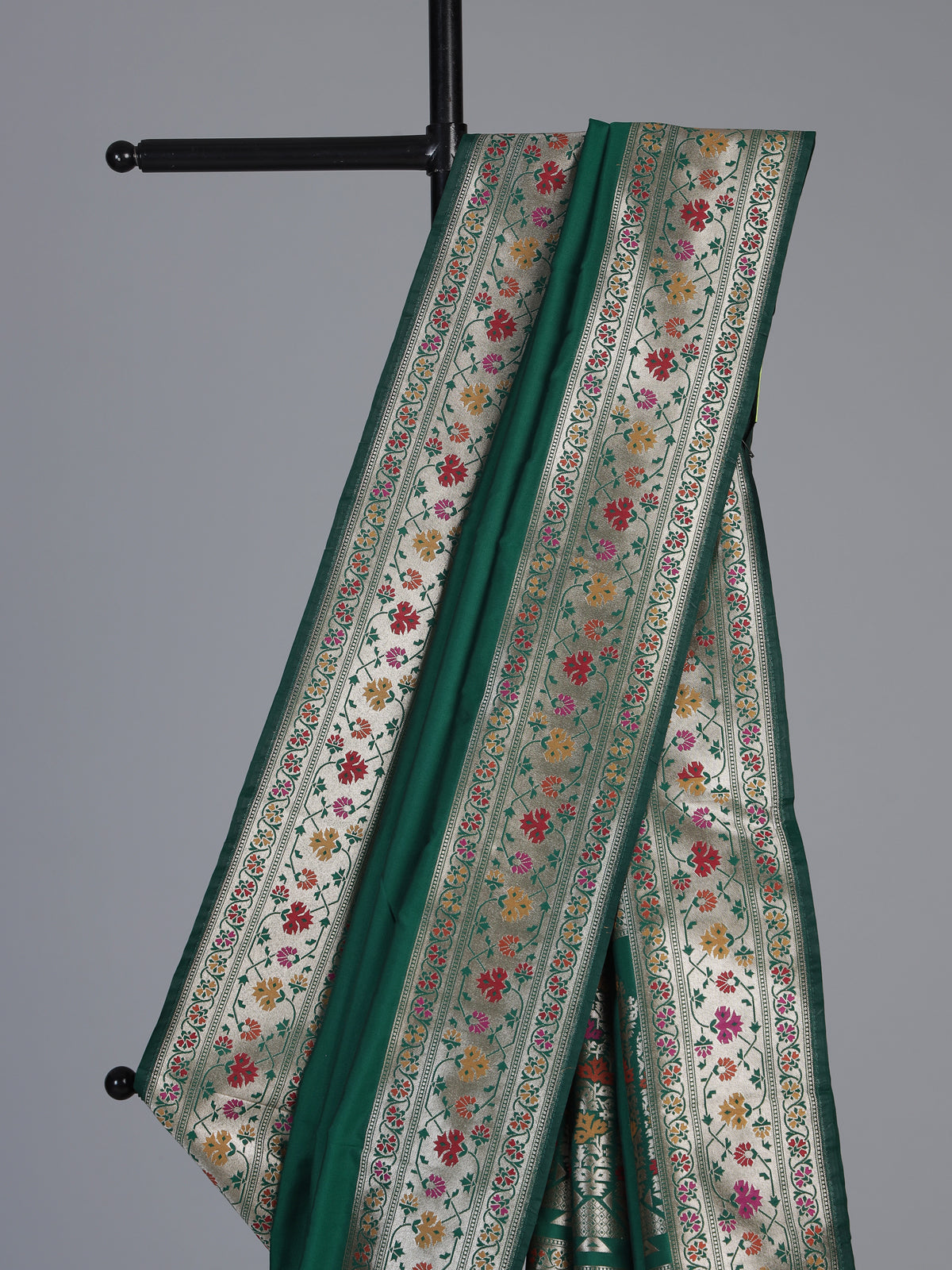 Green paithani silk saree with floral motifs and rich zari