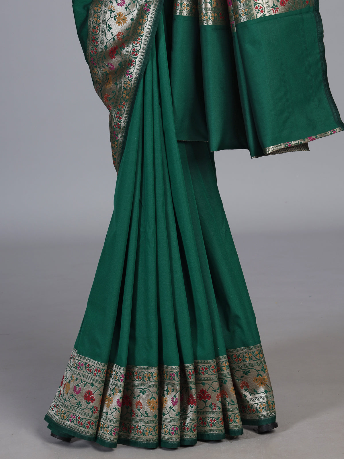 Green paithani silk saree with floral motifs and rich zari