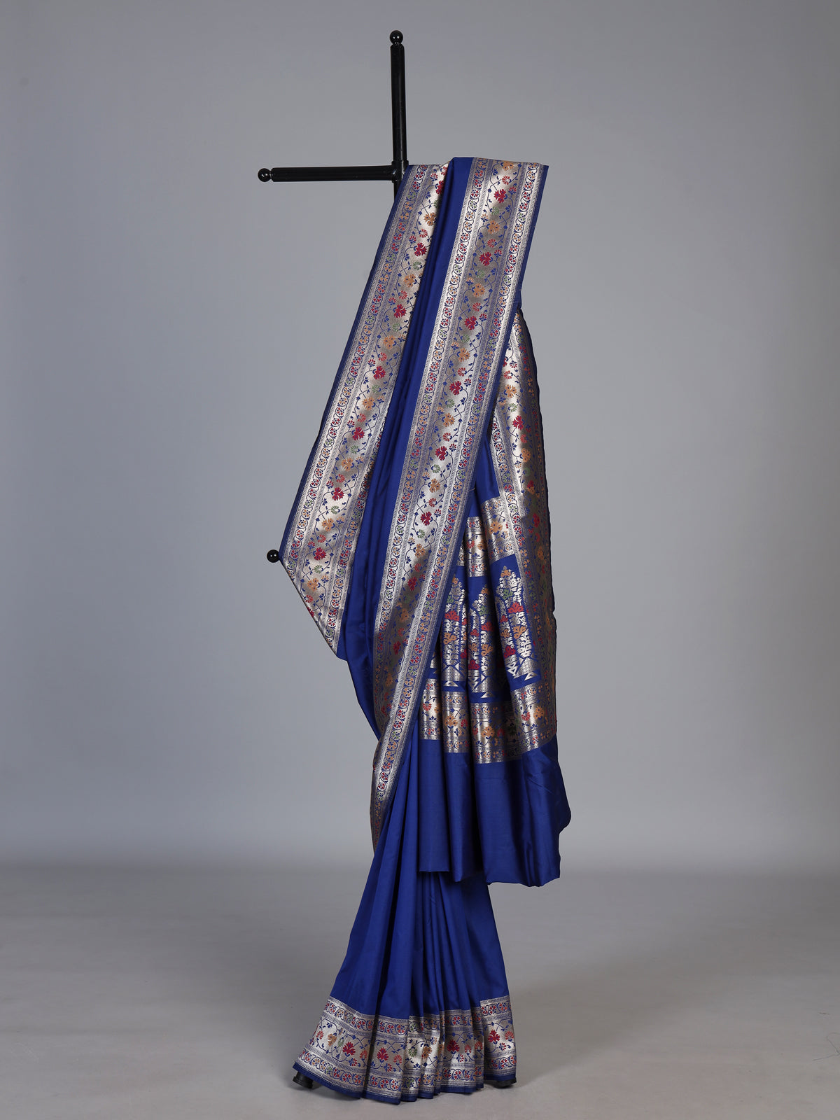 Blue paithani silk saree with floral motifs and zari elegance