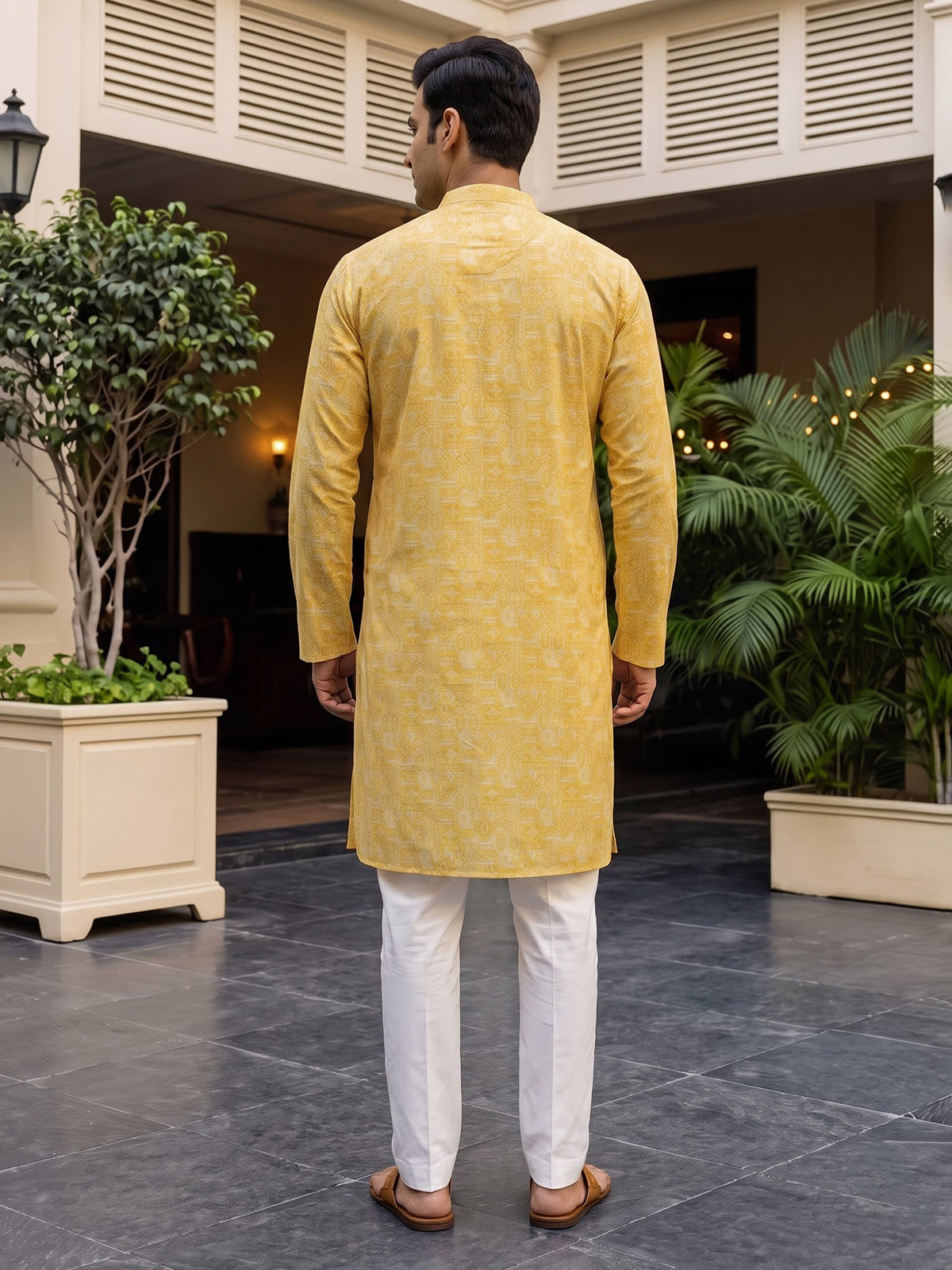 Yellow silk printed festive kurta suit for men with elegant mandarin collar