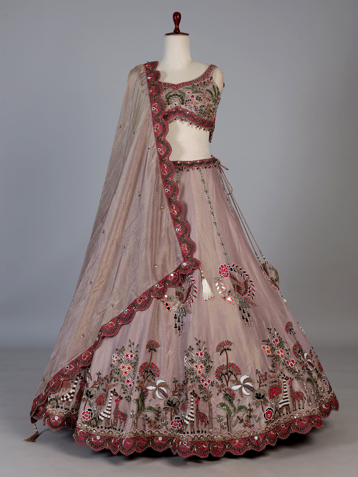 Pastel beige silk bird motif lehenga choli for designer