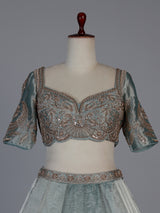 Pastel blue silk embellished lehenga choli with dupatta