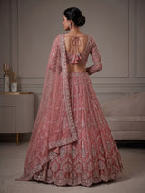 Peach designer net lehenga choli with graceful dupatta
