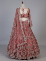 Peach designer net lehenga choli with graceful dupatta
