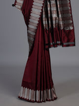 Maroon satin silk saree with elegant zari border and pallu