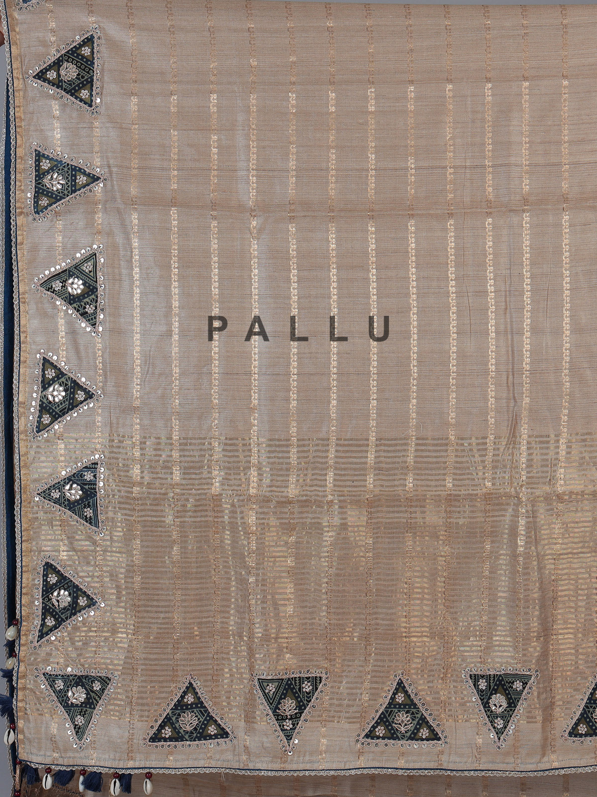 Beige tusser silk saree with regal zardosi embellishments
