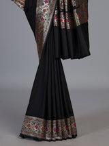 Black paithani silk saree with floral motifs and zari work