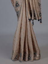 Beige tusser silk saree with regal zardosi embellishments