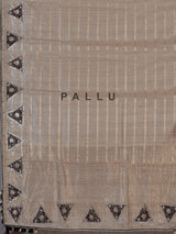 Pastel beige tusser silk saree with traditional handcrafted embellishments