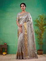 Pastel beige tissue silk saree with bird motif