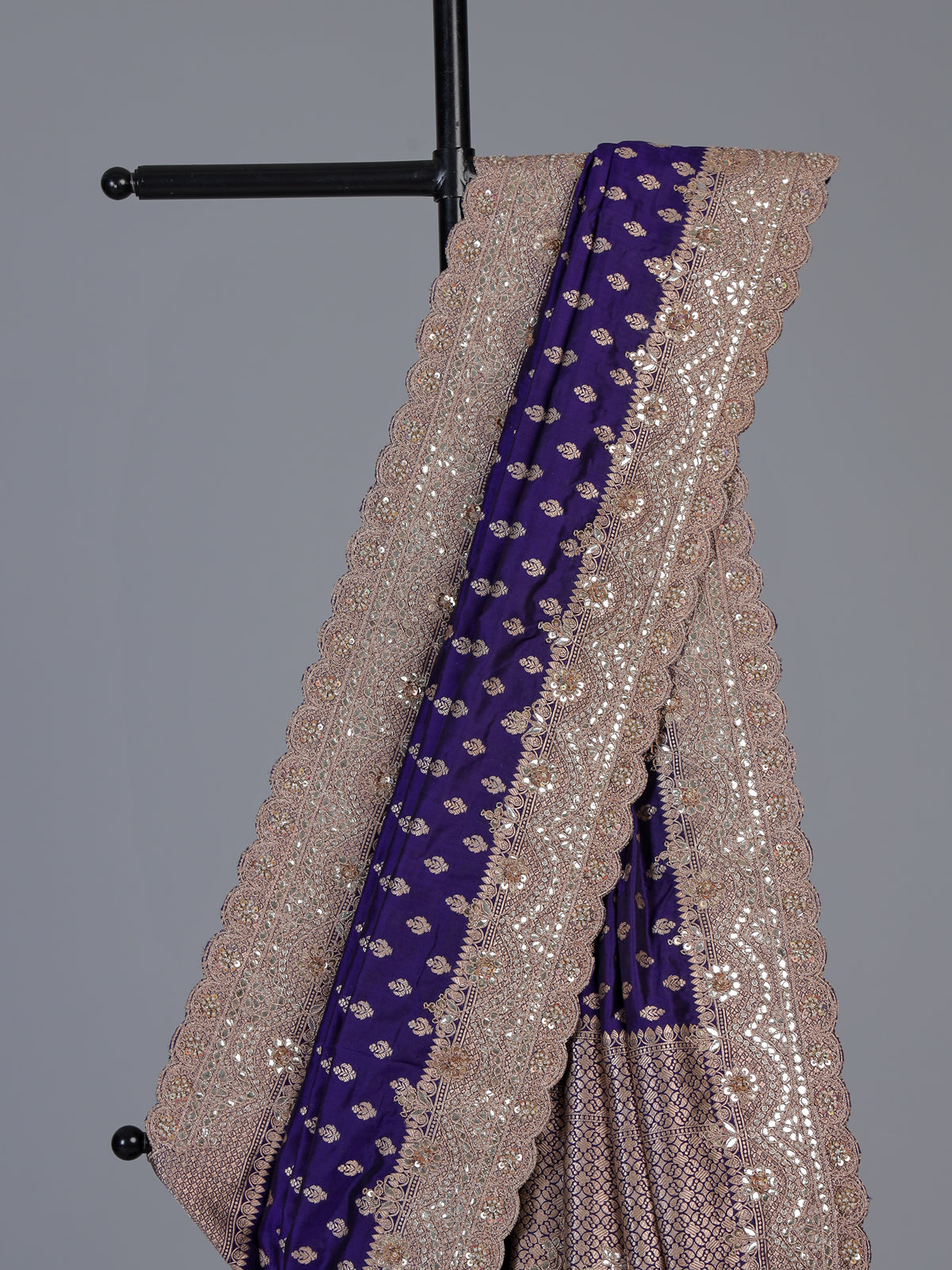 Blue banarasi silk saree with elegant butti and handwork design
