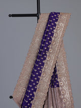 Blue banarasi silk saree with elegant butti and handwork design