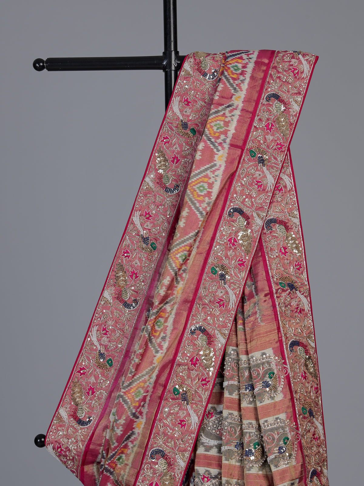 Rani pink tissue patola silk saree with bird motifs