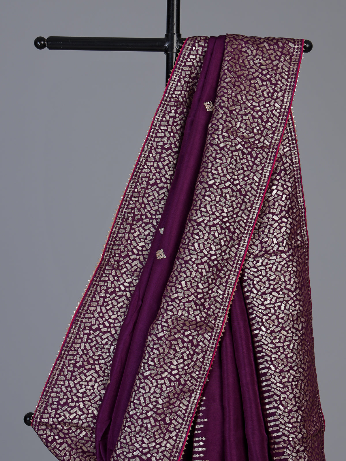 Purple dola silk saree with elegant butti pallu design