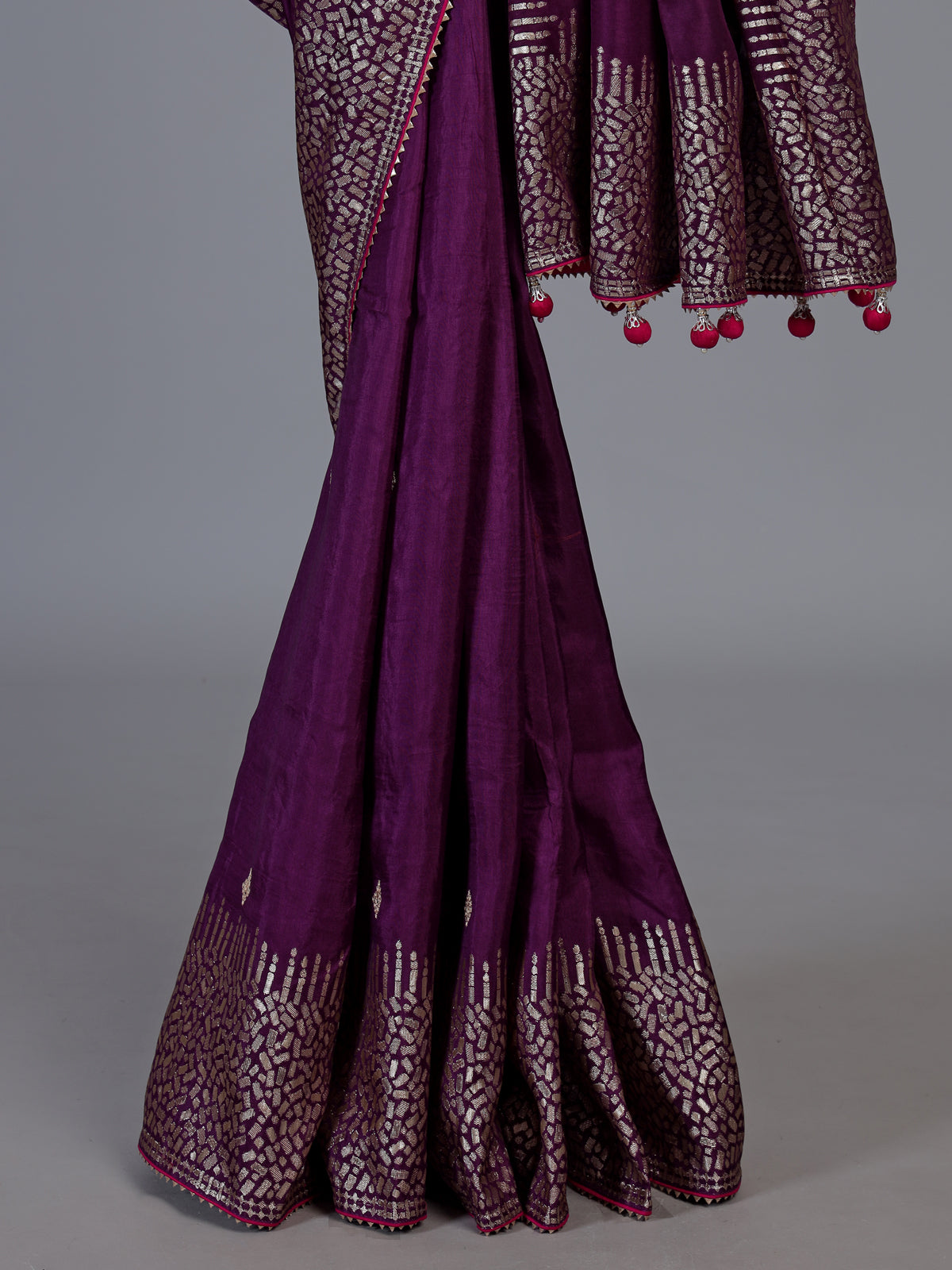 Purple dola silk saree with elegant butti pallu design