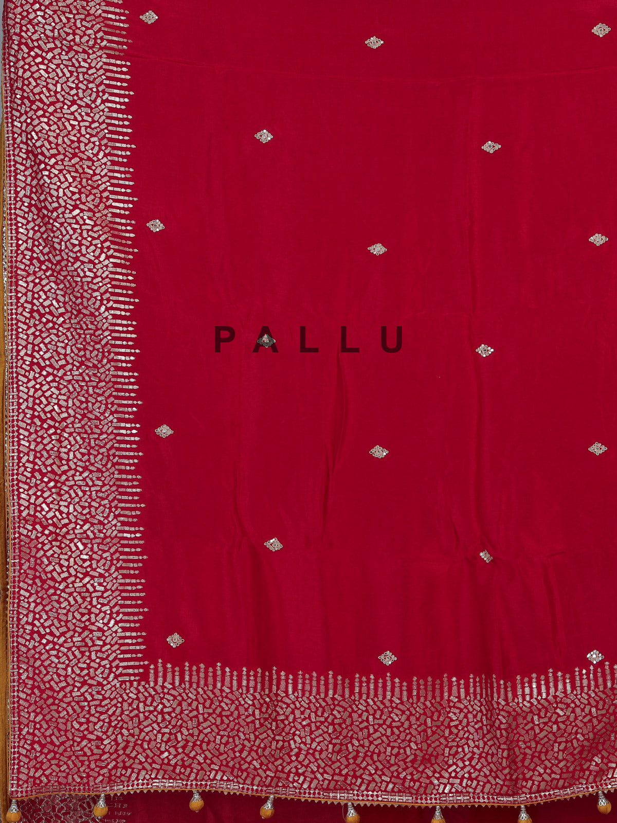 Red dola silk saree with traditional butti pallu work