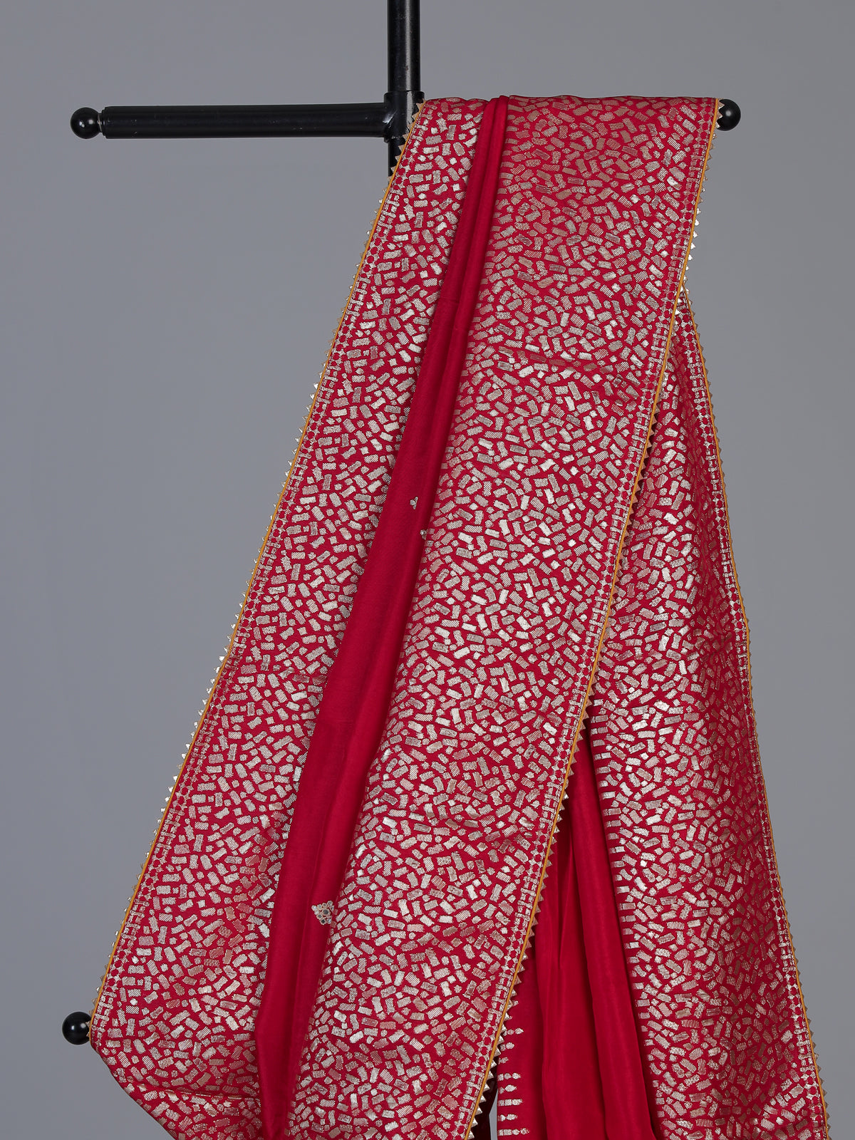 Red dola silk saree with traditional butti pallu work