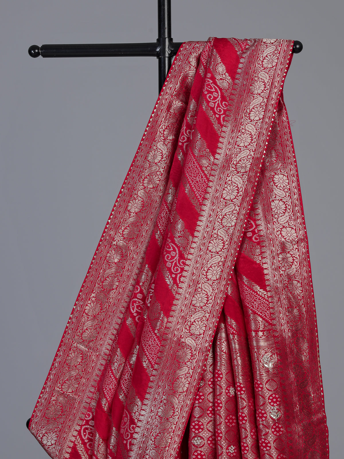 Red satin dola silk saree with elegant butti handwork